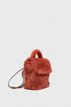 Image of Shearling mini-rugzak voor dames, koraalwol