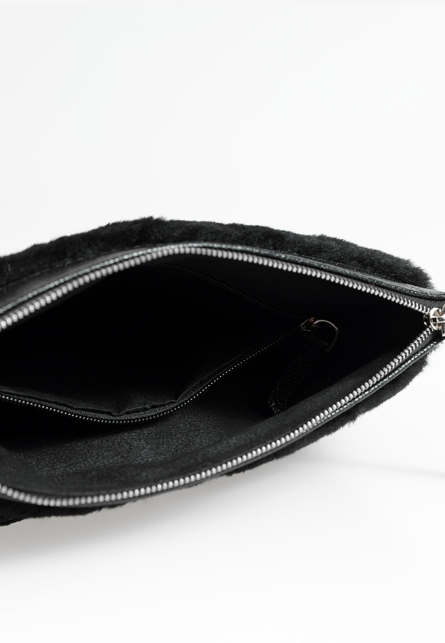 Shearling-clutch voor dames, zwarte wol met patroon